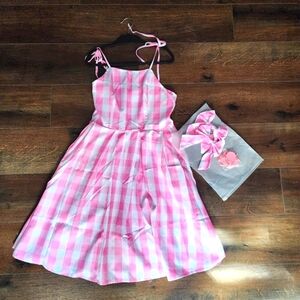 Barbie inspired pink and white plaid dress, bows and necklace.